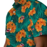 carolina-hurricanes-hawaiian-shirt-hibiscus-and-palm-leaves-best-selling.webp
