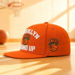 Spike-Lee-2026-Finals-Game-2-Brooklyn-Stand-Up-Knicks-Graphic-Hat-for-Basketball-Fans.jpg