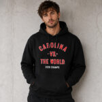Unisex-Carolina-Hockey-vs.-The-World-2026-Champs-Graphic-Shirt-for-Hockey-Fans.jpg
