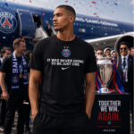 Unisex-Paris-Saint-Germain-UEFA-Champions-League-2026-Together-We-Win-Again-Graphic-Shirt-for-Soccer-Fans.jpg
