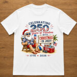 Unisex Christmas in July 250 Years of Freedom 1776-2026 Patriotic Summer Santa Graphic Shirt for Patriotic Fans