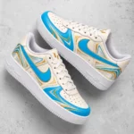 Lionel-Messi-GOAT-Cream-Blue-Gold-Shoes-Sneakers-for-Soccer-Fans.webp