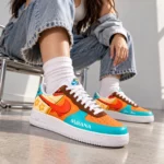 Moana-Tropical-Island-Adventure-Orange-Teal-Shoes-Sneakers-for-Disney-Fans.webp